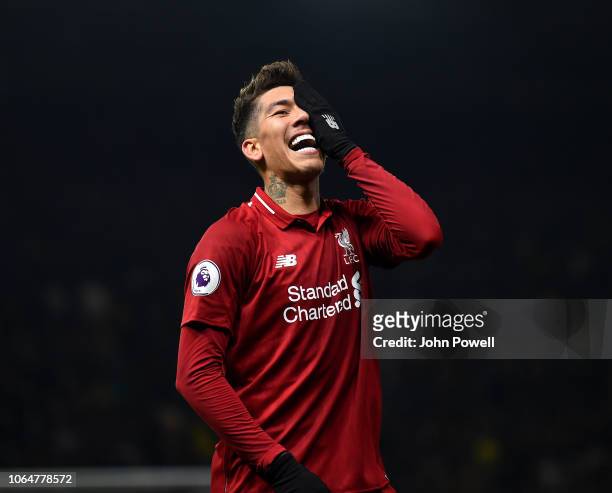 Roberto Firmino of Liverpool celebrates after scoring the third goal during the Premier League match between Watford FC and Liverpool FC at Vicarage...