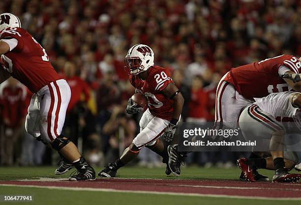 James White of the Wisconsin Badgers runs against the Ohio State Buckeyes at Camp Randall Stadium on October 16, 2010 in Madison, Wisconsin....