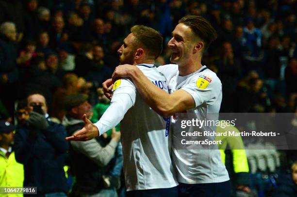 Preston North End's Louis Moult celebrates scoring his side's third goal with team-mate Ben Davies during the Sky Bet Championship match between...