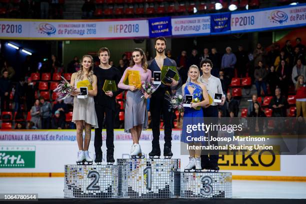 Victoria Sinitsina and Nikita Katsalapov of Russia, Gabriella Papadakis and Guillaume Cizeron of France, Piper Gilles and Paul Poirier of Canada pose...