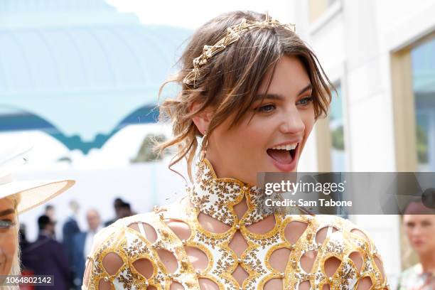 Montana Cox arrives at the Birdcage on route to the Kennedy Marquee on Oaks Day at Flemington Racecourse on November 08, 2018 in Melbourne, Australia.