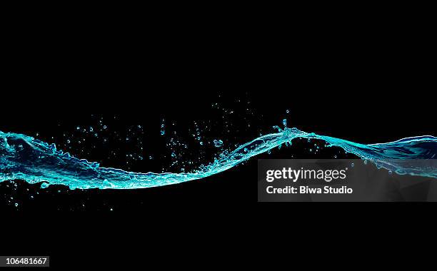 fluorescent blue water splash black background - 液體 個照片及圖片檔