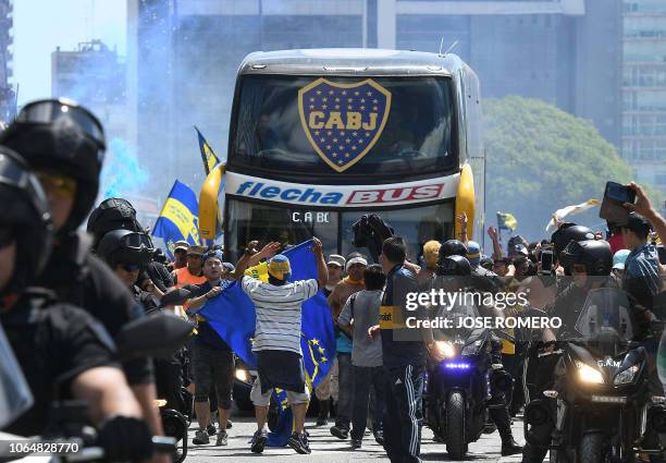 Picture released by Telam showing the Boca Juniors team bus leaving their hotel on the way to the Monumental stadium in Buenos Aires, on November 24,...