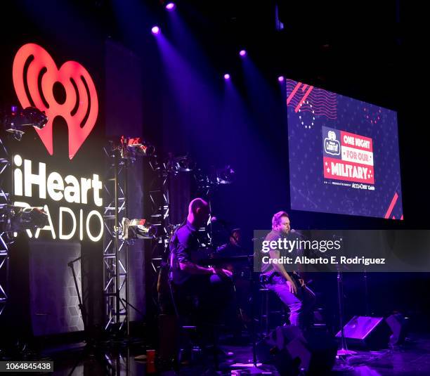 Mike Eli of the Eli Young Band performs onstage at iHeartCountry One Night For Our Military Presented By The Makers of Accu-Chek Guide at iHeartRadio...