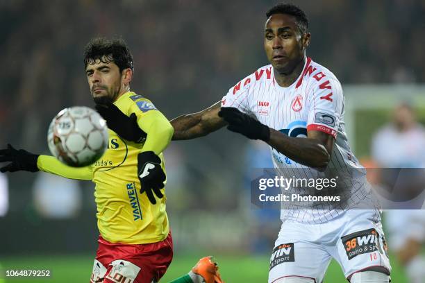Kanu Rubenilson Dos Santos midfielder of Kortrijk is fighting for the ball with Fernando Matos Canesin midfielder of Oostende during the Jupiler Pro...