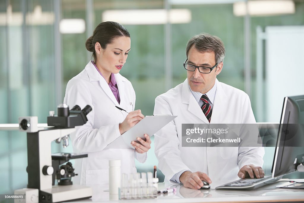 Lab Operator Image Lab Technicians With Microscope Working In Laboratory High-Res Stock ...