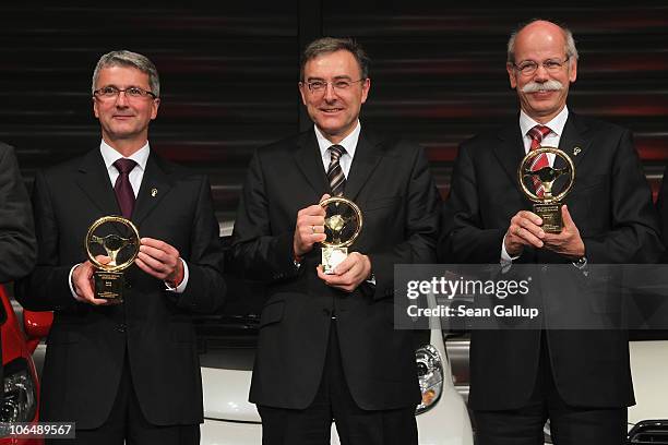Audi AG Chairman Rupert Stadler, BMW Group Chairman Norbert Reithofer and Daimler AG Chairman Dieter Zetsche attend the 2010 Das Goldene Lenkrad...
