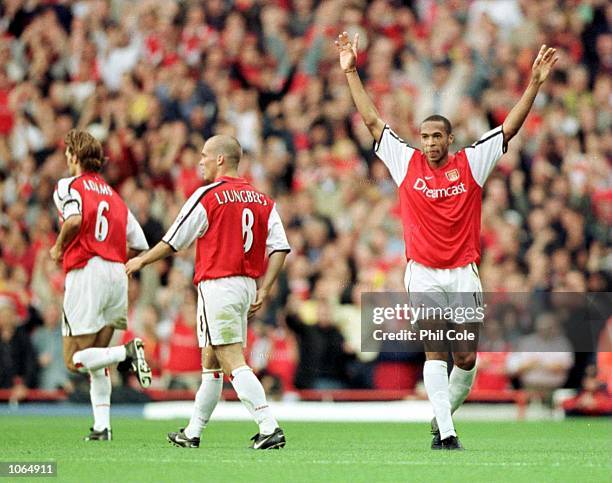 Thierry Henry of Arsenal celebrates after scoring during the FA Carling Premiership game between Arsenal and Manchester United at Highbury in London....
