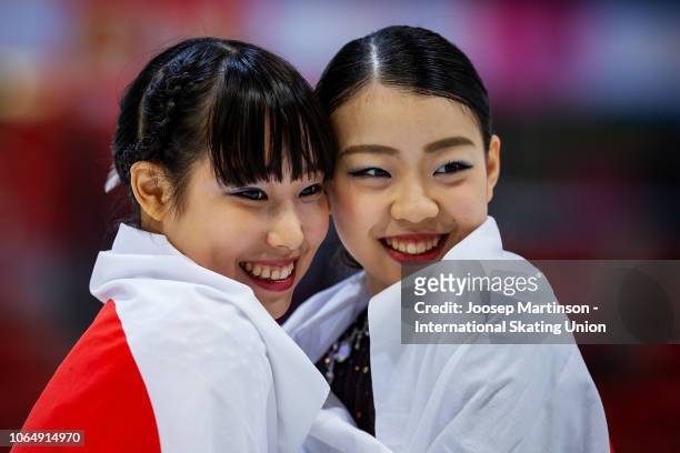 Mai Mihara of Japan and Rika Kihira of Japan pose in the Ladies medal ceremony during day 2 of the ISU Grand Prix of Figure Skating Internationaux de...