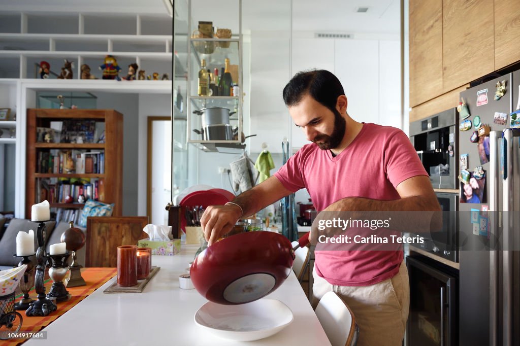 Man cooking at home