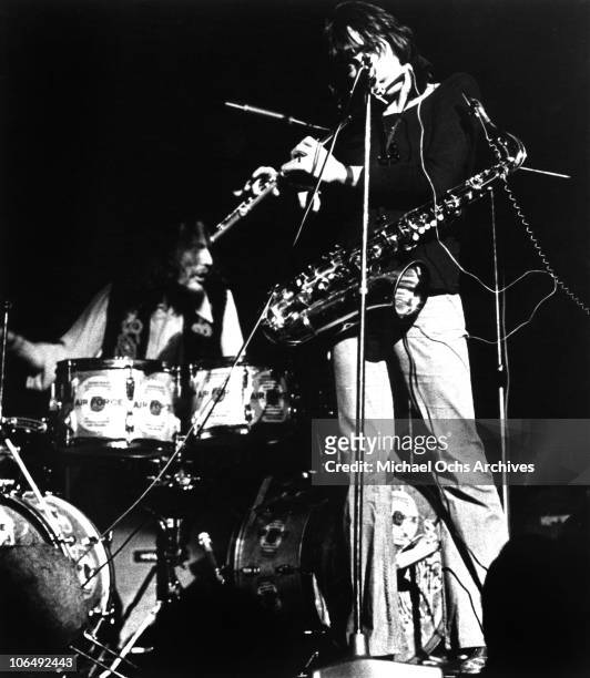 Drummer Ginger Baker and Chis Wood of the rock group Air Force perform onstage circa 1970.