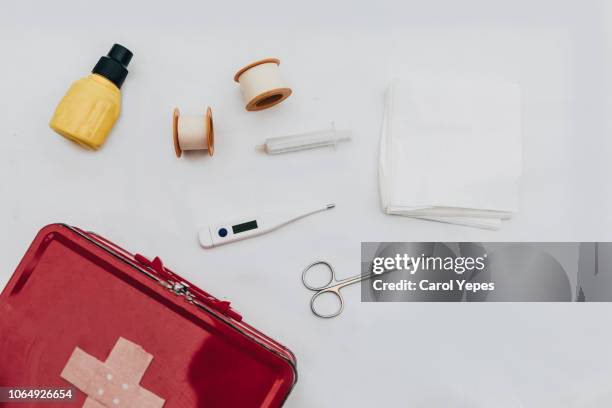 first aid kit in flat lay - first aid kit stock-fotos und bilder