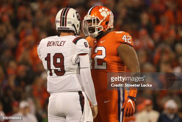 Christian Wilkins of the Clemson Tigers reacts in the face of Jake Bentley of the South Carolina Gamecocks during their game at Clemson Memorial...