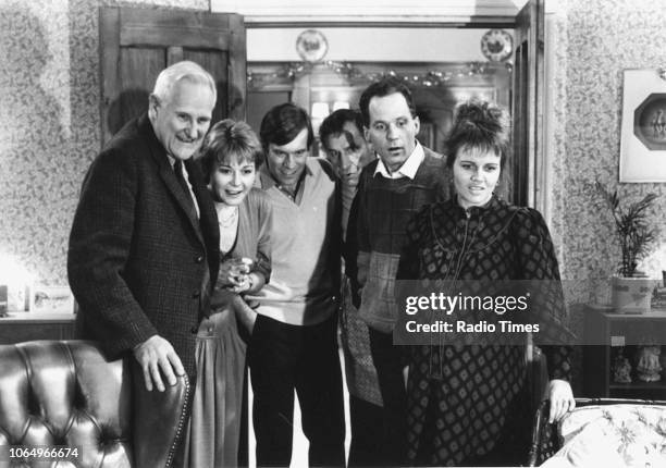 Actors Peter Vaughan, Barbara Flynn, Vicky Henson, Geoffrey Palmer, Michael Cashman and Leslie Dunlop in a scene from the BBC television play...