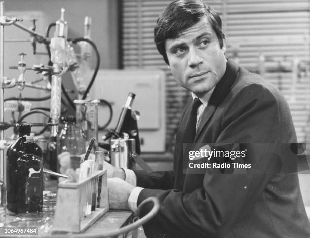 Actor Oliver Reed pictured in a science laboratory, circa 1965.