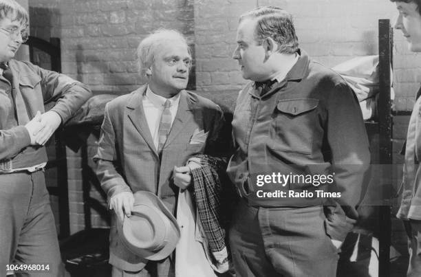 Actors Christopher Biggins, David Jason, Ronnie Barker and Richard Beckinsale in a scene from episode 'Pardon Me' of the television sitcom...