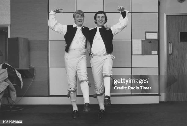 Television presenters Terry Wogan and Pete Murray wearing matching outfits, photographed for Radio Times in connection with the Eurovision Song...