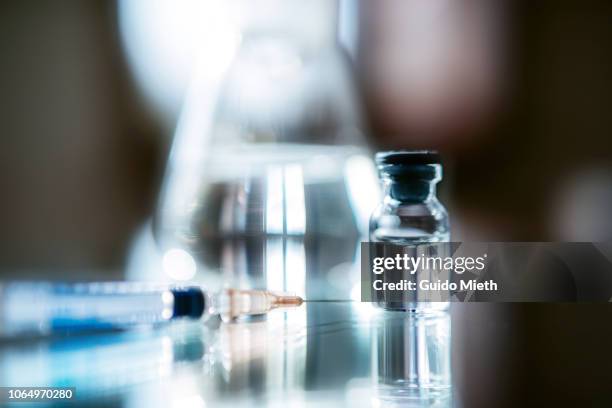syringe and a flask and a vial. - botoxinjektion bildbanksfoton och bilder