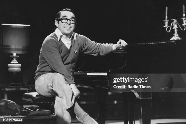 Comic actor Ronnie Corbett pictured sitting at a piano, February 18th 1978.