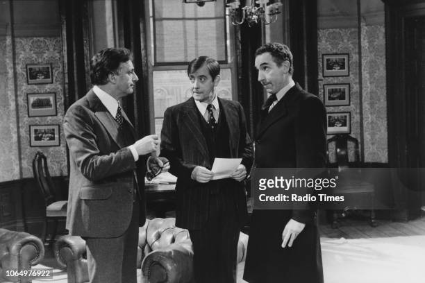 Actors Paul Eddington, Derek Fowlds and Nigel Hawthorne in a scene from the television sitcom 'Yes Minister', February 4th 1979.