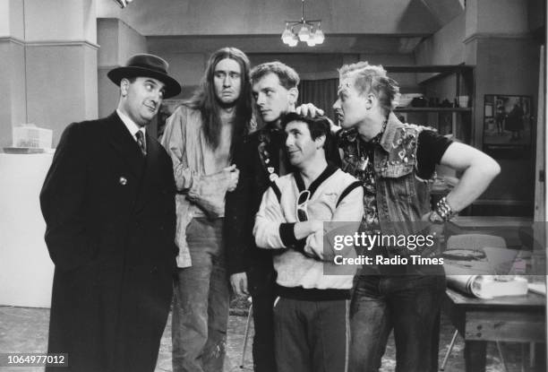 Actors Alexei Sayle, Nigel Planner, Rik Mayal, Christopher Ryan and Adrian Edmondson in a scene from the television sitcom 'The Young Ones', January...