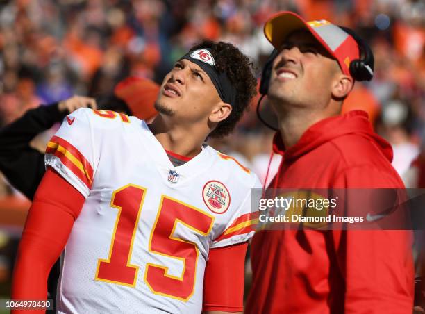 Quarterback Patrick Mahomes and quarterbacks coach Mike Kafka of the Kansas City Chiefs on the sideline prior to a game against the Cleveland Browns...