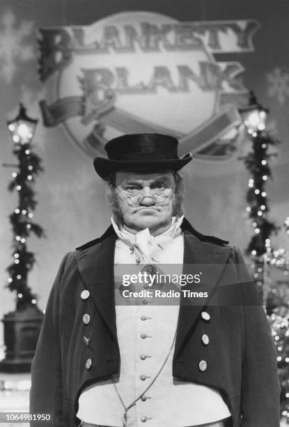 Comedian Les Dawson in costume during the recording of the Christmas special of the television quiz show 'Blankety Blank', November 22nd 1987.