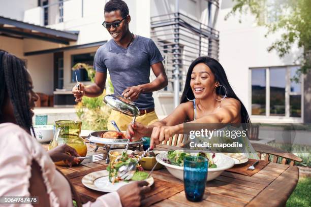 family and food, two of life's best - family barbeque garden stock pictures, royalty-free photos & images