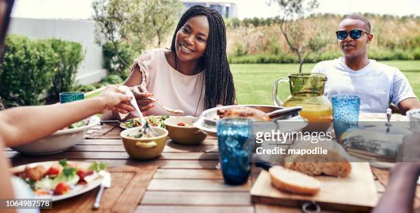 happiness is sharing sunday lunch with family - south africa food stock pictures, royalty-free photos & images