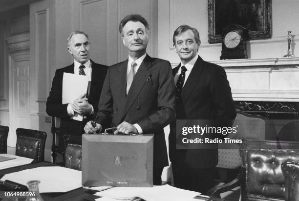 Actors Nigel Hawthorne, Paul Eddington and Derek Fowlds in a scene from the television series 'Yes, Prime Minister', November 1st 1987.