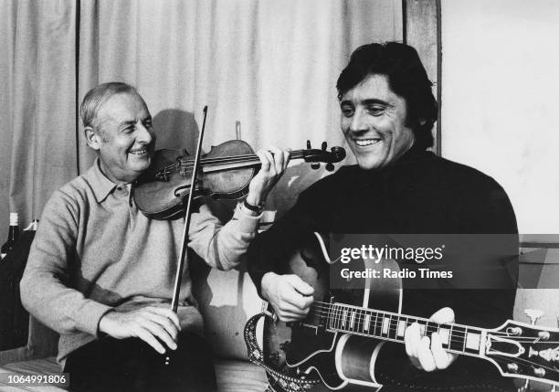 Portrait of jazz violinist Stephane Grappelli and singer Sacha Distel, October 23rd 1970.