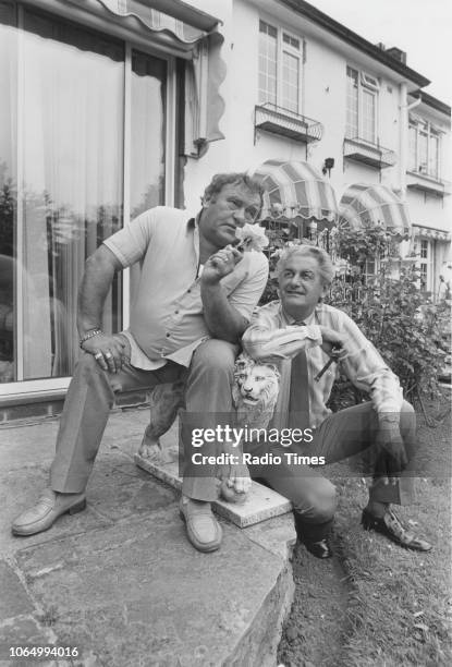 Comedian Les Dawson and broadcaster Clay Jones pictured outside Dawson's home in Lytham, Lancashire, July 9th 1984.