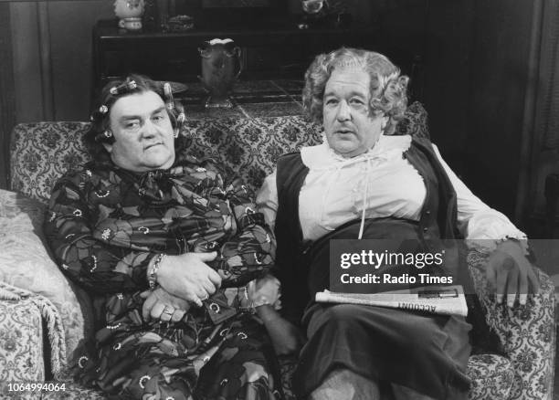 Comedians Les Dawson and Roy Barraclough dressed as women, in costume as the characters Cissie and Ada in a sketch from 'The Les Dawson Show',...