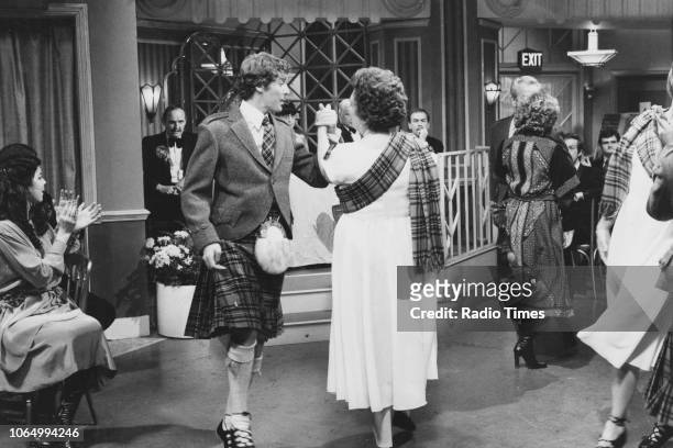 Actor Michael Crawford wearing a kilt during a dance scene from episode 'Scottish Dancing' of the television sitcom 'Some Mothers Do 'Ave 'Em',...