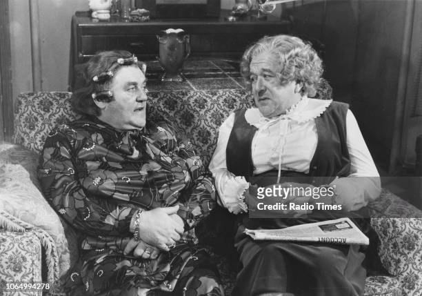 Comedians Les Dawson and Roy Barraclough dressed as women, in costume as the characters Cissie and Ada in a sketch from 'The Les Dawson Show',...