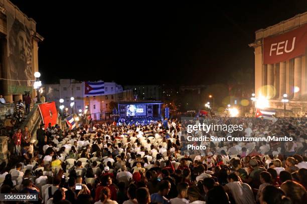 Pictures of late Cuban revolution leader Fidel Castro are displayed as thousands of students commemorate the second anniversary of Castro's death, at...