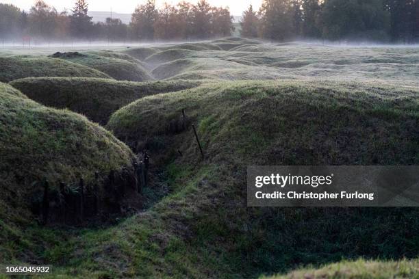 The sunrise burns off the morning mist over the remains of trenches in the Newfoundland Memorial Park at Beaumont Hamel on November 09, 2018 in...