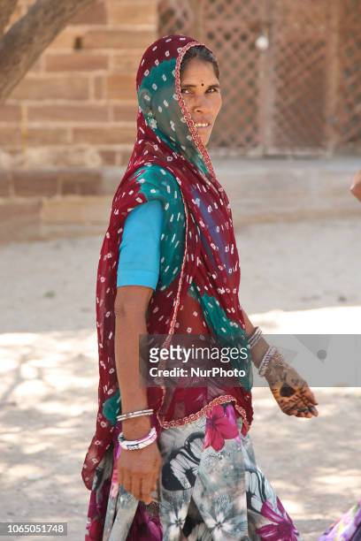 Everyday life images of women in the city of Jodphur in Rajasthan, India. Women in India, especially in Rajasthan are typically used to wear...