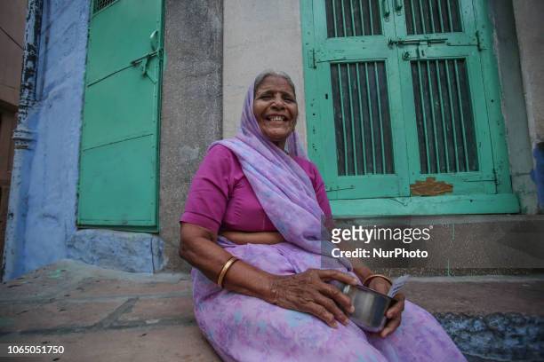 Everyday life images of women in the city of Jodphur in Rajasthan, India. Women in India, especially in Rajasthan are typically used to wear...