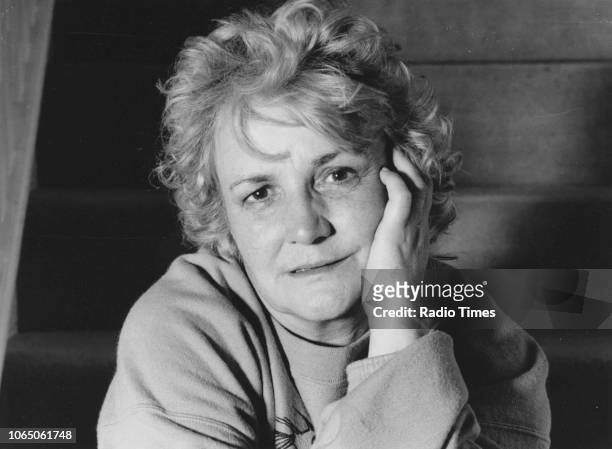 Portrait of actress Jean Boht on the staircase of her home, photographed for Radio Times in connection with the television drama 'Screenplay: Eskimos...