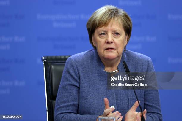 German Chancellor Angela Merkel speaks after attending a special session of the European Council over Brexit on November 25, 2018 in Brussels,...