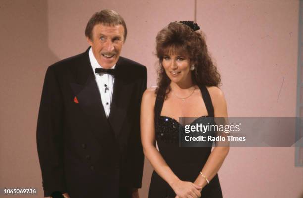 Entertainer Bruce Forsyth and model Linda Lusardi presenting the BBC television show 'Bruce Foryth's Easter Show', February 26th 1991.