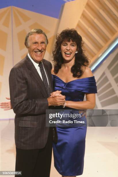 Entertainer Bruce Forsyth and his assistant Rosemarie Ford presenting the BBC television show 'The Generation Game', August 1st 1990.