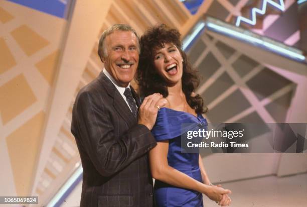 Entertainer Bruce Forsyth and his assistant Rosemarie Ford presenting the BBC television show 'The Generation Game', August 1st 1990.