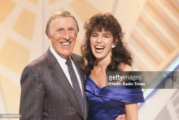 Entertainer Bruce Forsyth and his assistant Rosemarie Ford presenting the BBC television show 'The Generation Game', August 1st 1990.