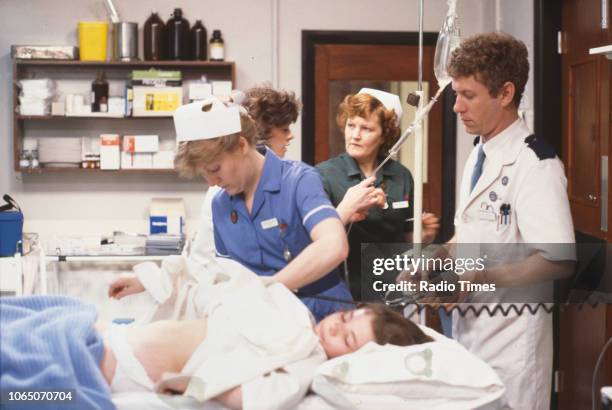 Actors Catherine Shipton, Julia Watson, Brenda Fricker and Derek Thompson in a scene from the BBC television series 'Casualty', April 10th 1986.