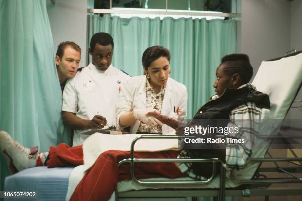 Actors Robson Green, Patrick Robinson and Mamta Kaash in a scene from episode 'Something to Hide' of the BBC television series 'Casualty', May 15th...