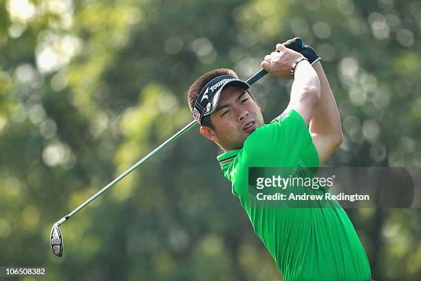 Yuta Ikeda of Japan hits his tee-shot on the 12th hole during the first round of the WGC-HSBC Champions at Sheshan International Golf Club on...