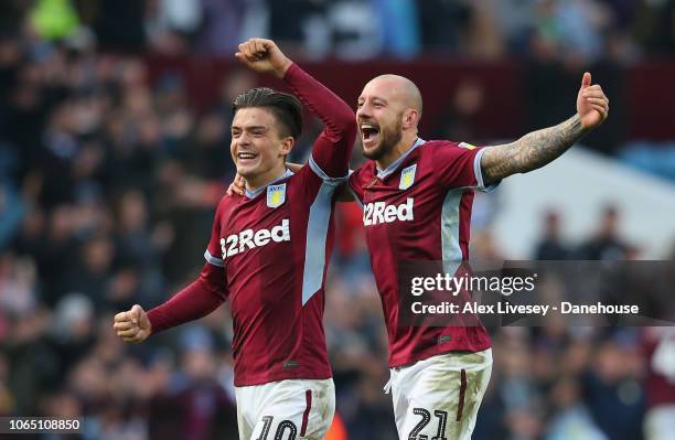 Jack Grealish and Alan Hutton of Aston Villa celebrate after the Sky Bet Championship match between Aston Villa and Birmingham City at Villa Park on...