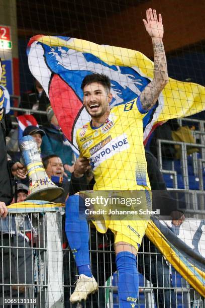 Taxiarchis Fountas of St. Poelten celebrates the victory with the fans during the tipico Bundesliga match between SKN St. Poelten and FC Wacker...